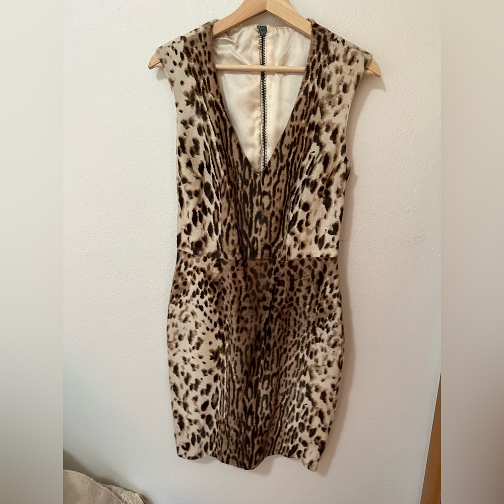 Real cow hide dress w silk liner.